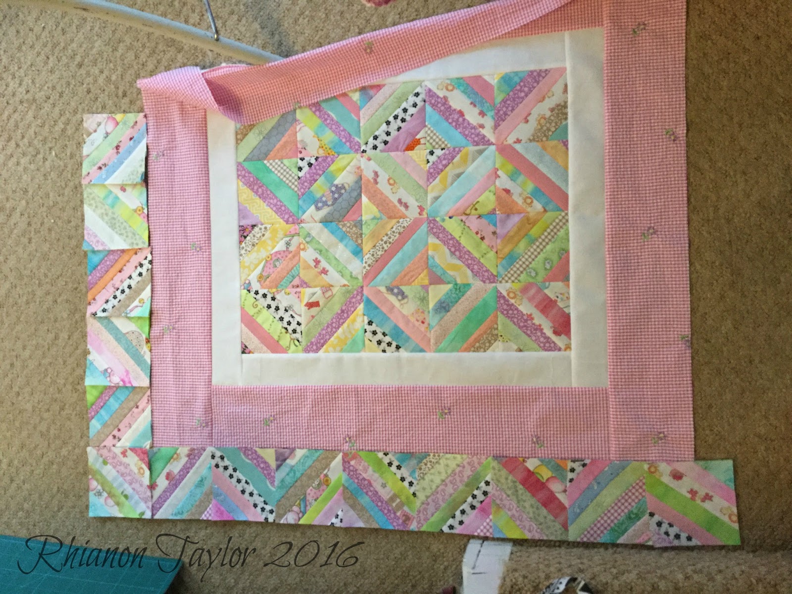 The Nifty Stitcher Scrappy Strings Baby Quilt