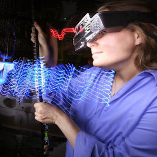 Alison Humphrey experimenting with a prototype Meta augmented reality headset