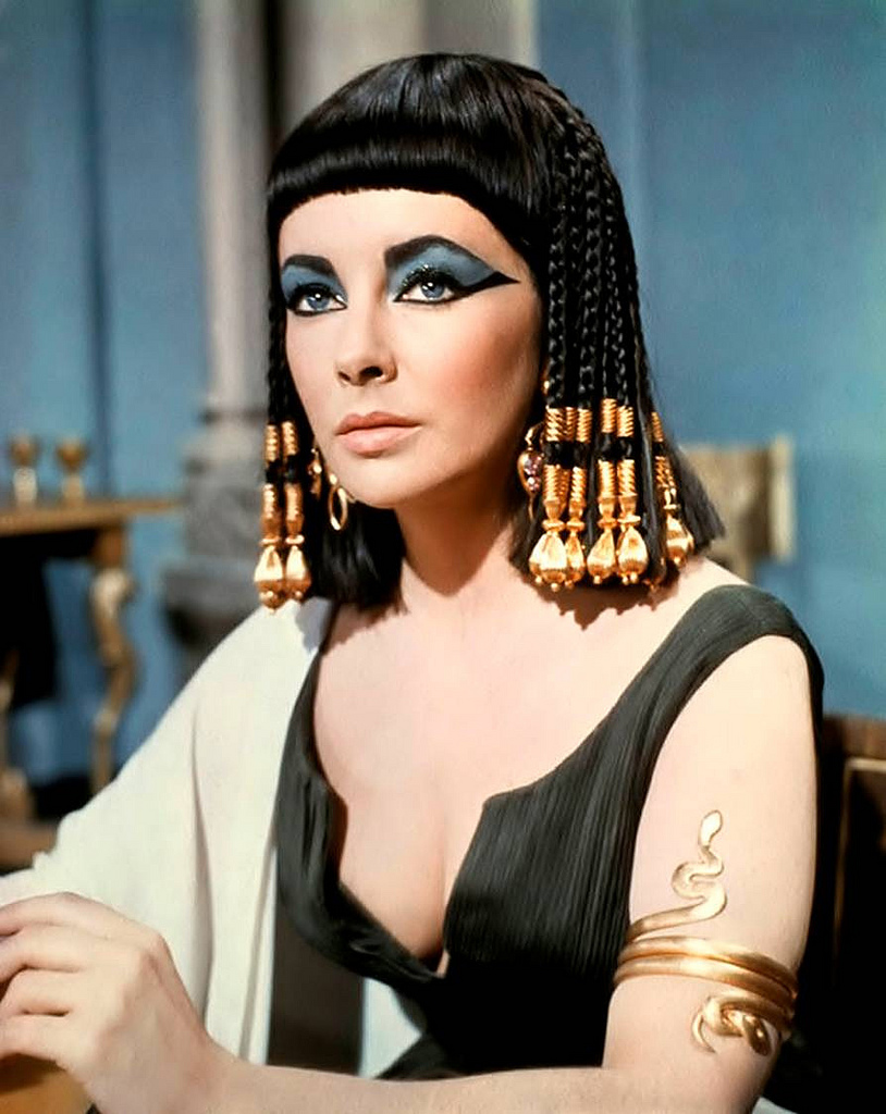 Cleopatra stunning wearing blue eyeshadow and blush