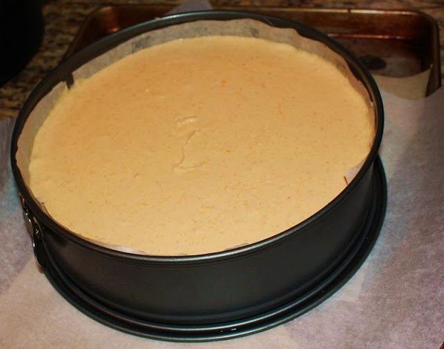 this is how to make a pumpkin cheesecake with a cinnamon graham cracker crust baked. This is an Amaretto Pumpkin Cheesecake with a cinnamon sugar topping. This easy recipe shows you how to make this decadent pumpkin cheesecake step by step. The crust, filling and topping is all baked from scratch using a spring form pan.
