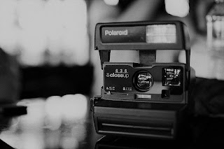 pixabay - pexels polaroid camera on table