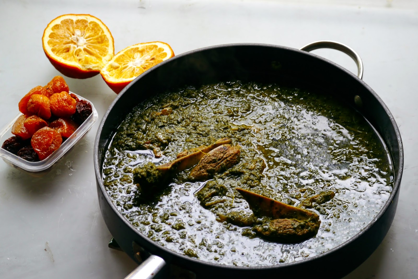Khoresh e Aloo Esfenaj; Persian style spinach and dried plum lamb stew