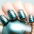 Nail art zebrata azzurro e glitter