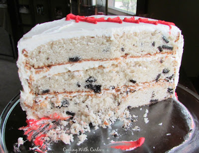 inside of sliced cookies and cream layer cake