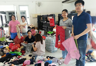 folding clothes for donation