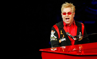 "Lirik Lagu Elton John - Rocket Man"