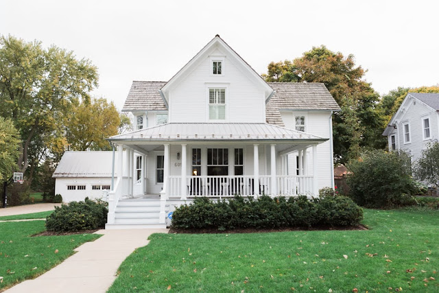 Beautiful white modern farmhouse with front porch on Hello Lovely Studio