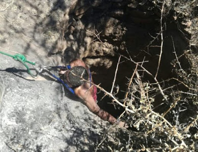 Jungle Justice: Two men brutally beaten and thrown into a deep well in South Africa (photos)