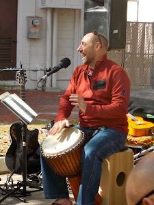 Jimbo having a great time leading the drumming circle.