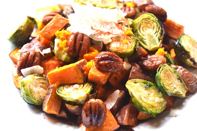 Orange Glazed Brussels Sprouts and Sweet Potatoes are a perfect mix of sweet and savory that would be a great healthier side dish for any holiday party! www.nutritionistreviews.com