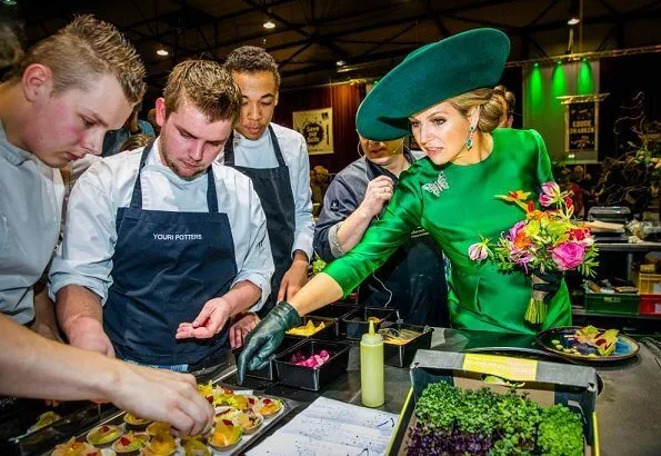 2018 Dutch Organic Trade Fair at IJsselhallen Convention Center in Zwolle. Queen Maxima wore Natan dress and Natan shoes, green diamond earrings