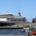 a hotel overlooking the cruise ship