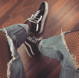 Fishnet stockings underneath ripped/distressed jeans image of Fishnet stockings underneath ripped/distressed jeans