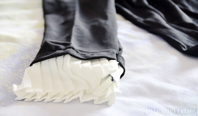 Twist X Turn Fashion Review: Monochrome Minimalist Tops Details on the ruffled pleated black-and-white self-tie long sleeve button down blouse from Twist X Turn.