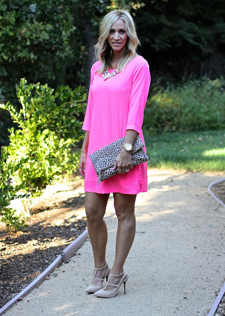 pink sheath dress studded pumps