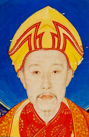 The Qianlong Emperor as Manjushri, the Bodhisattva of Wisdom. The emperor has had himself portrayed in the center of a thangka, a traditional Tibetan-style religious painting, but he called upon the Italian artist Giuseppe Castiglione, who was a Jesuit missionary serving at the Chinese court, to paint his face and the lotus that surrounded him. By having himself depicted as the enlightened being Manjusri, the Bodhisattva of Wisdom, the Qianlong emperor positioned himself squarely in the Tibetan Buddhist hierarchy. The landscape surrounding him is filled with auspicious clouds and a representation of the five-peaked, Wutaishan sacred mountain in China. The inscription on the painting proclaims Manjusri to be the ruler of the Buddhist faith.