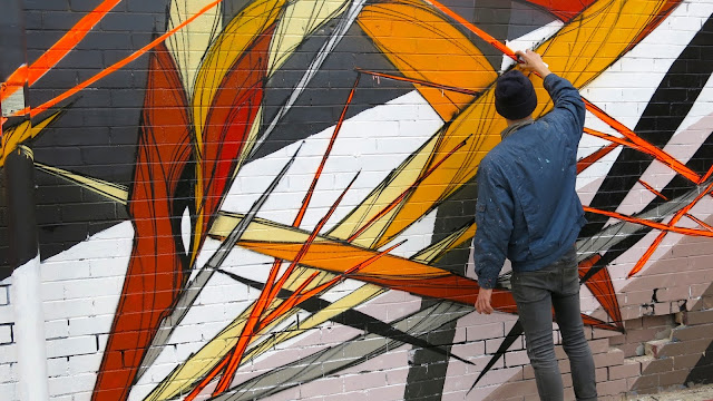 Shida At Work On A Mural In Sydney