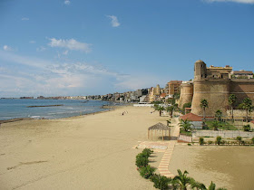The beach at Nettuno, Conti's home town, with the historic 500-year-old Forte Sangallo in the foreground