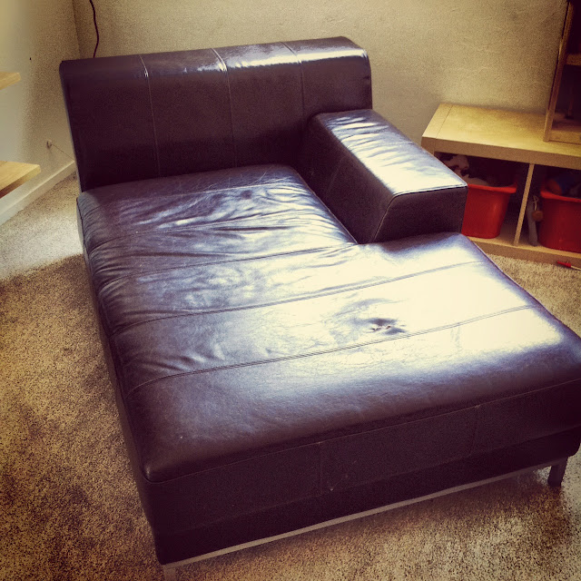 Fabric slipcovers over Leather Kramfors sofa