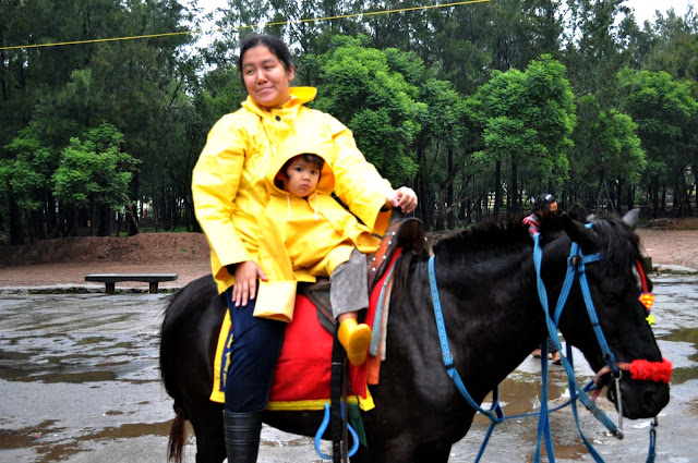 Mama and Kecil on horseback in Baguio