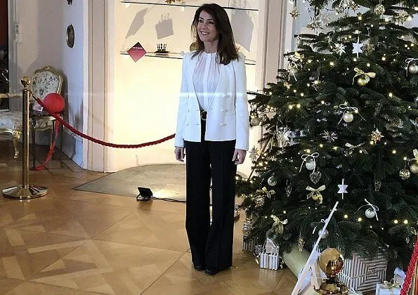 Princess Marie wore a tricotine jacket by Emporio Armani, and a new silk blouse by Hugo Boss