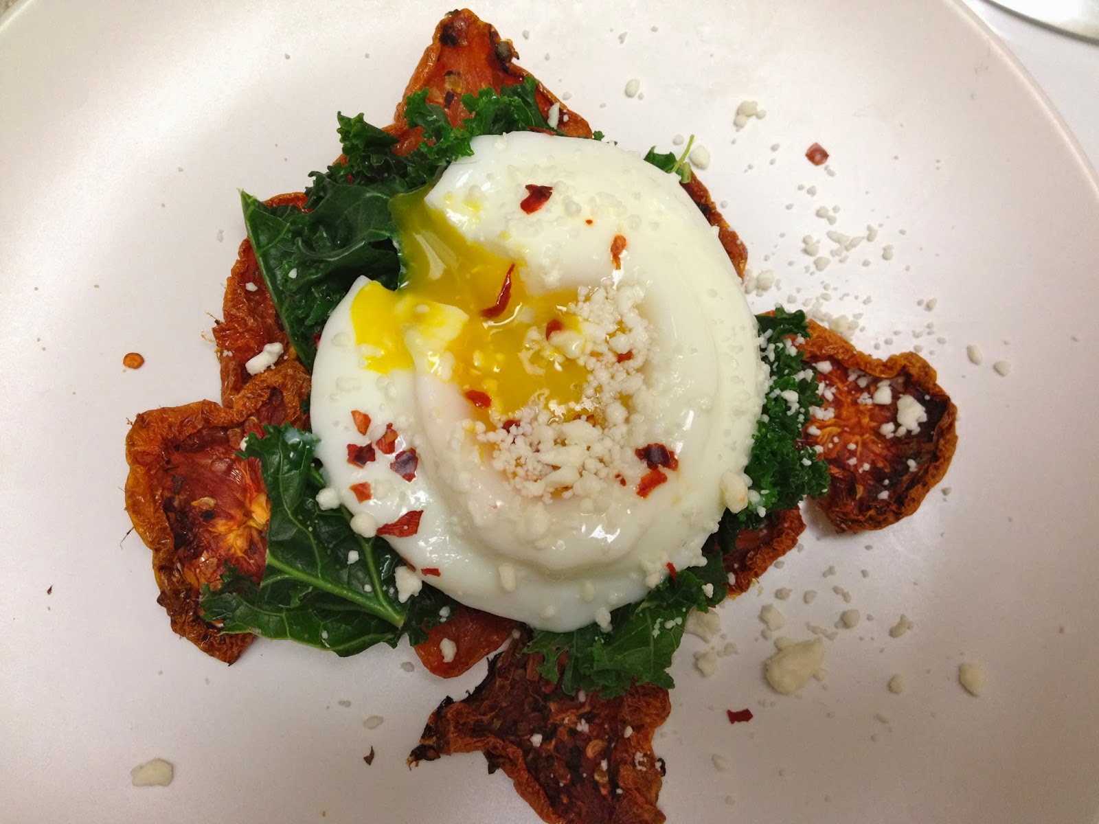 Avis Roasted tomato, kale, and poached egg
