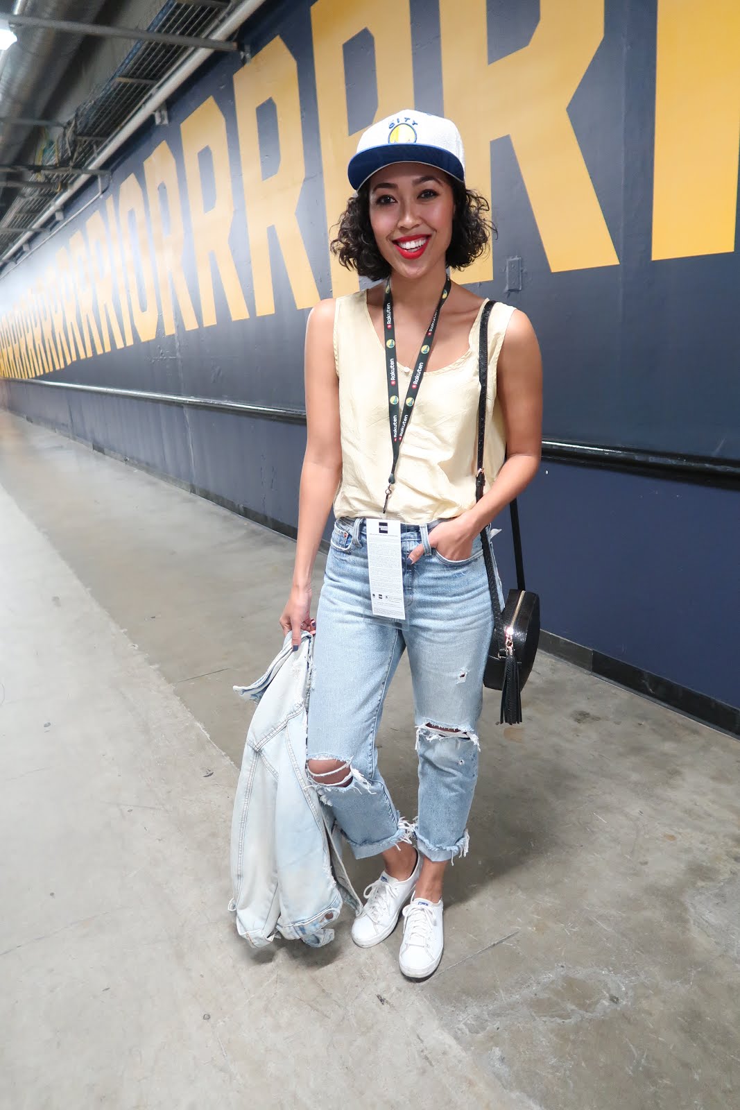 Warriors Game #OOTD What to wear to a Warriors Game: Distressed Jeans, team colors, and a snapback cap.