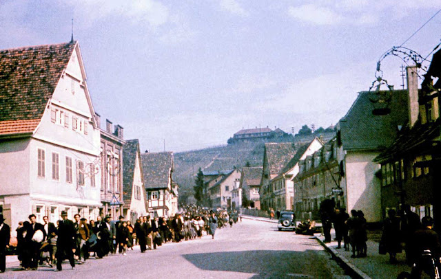 Sinti are marched down the street in Asperg on their way to Hohenasperg Prison prior to their deportation to camps in Poland. May 22, 1940.