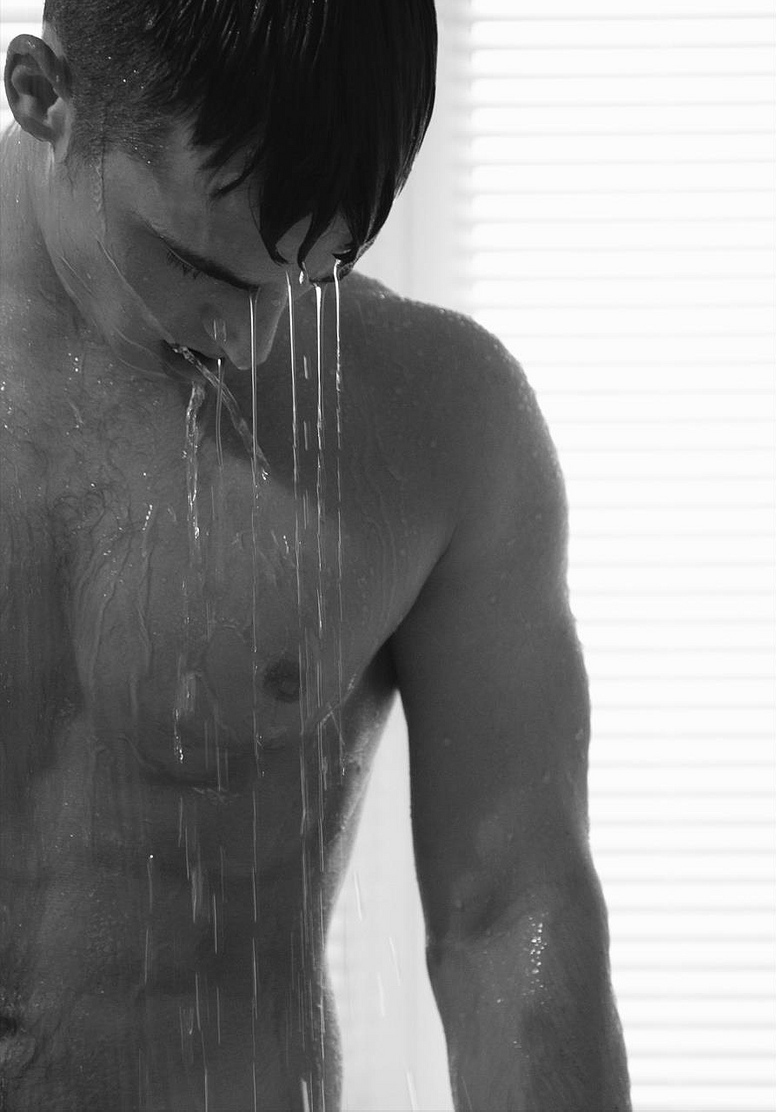 English model Cédric Andries gets soaking wet in this striking portrait ses...