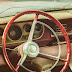 Retro Styled Image Of A Weathered Dusty Interior Of A Classic Car