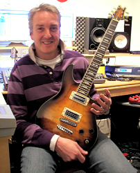 Steve Overland with Peavey guitar used on FM album METROPOLIS