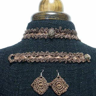 Conjunto ganchillo metálico en color bronce Conjunto ganchillo metálico en color bronce