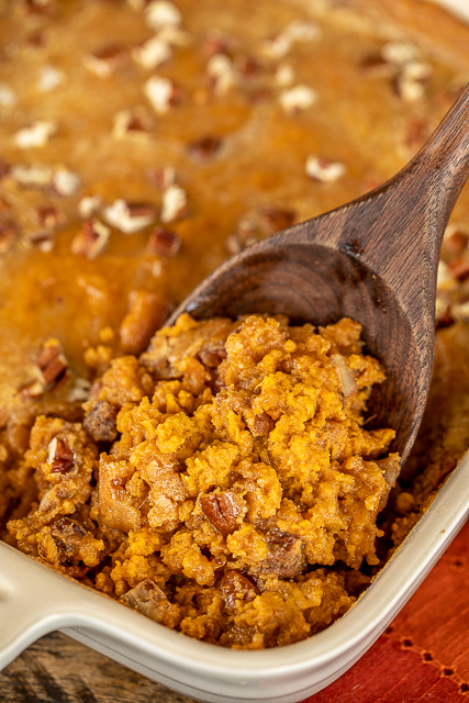 Praline Sweet Potato Casserole - our new favorite sweet potato casserole!! Mashed sweet potatoes topped with a crunchy praline topping - so much better than our usual marshmallow topped casserole!!! Sweet potatoes, eggs, heavy cream, brown sugar, vanilla, pecans, pumpkin pie spice, butter, sweetened condensed milk. Can make a day in advance and refrigerate until ready to eat. Perfect for Thanksgiving and Christmas! #sidedish #thanksgiving #christmas #sweetpotatoes Praline Sweet Potato Casserole - our new favorite sweet potato casserole!! Mashed sweet potatoes topped with a crunchy praline topping - so much better than our usual marshmallow topped casserole!!! Sweet potatoes, eggs, heavy cream, brown sugar, vanilla, pecans, pumpkin pie spice, butter, sweetened condensed milk. Can make a day in advance and refrigerate until ready to eat. Perfect for Thanksgiving and Christmas! #sidedish #thanksgiving #christmas #sweetpotatoes