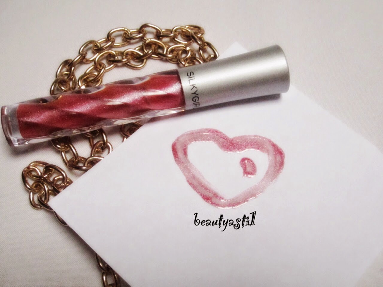 silkygirl-moisture-lipgloss-03-dazzling-pink.jpg