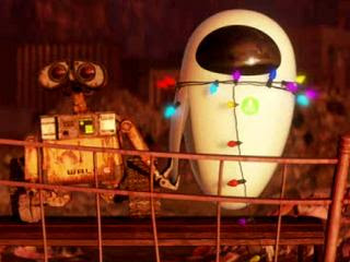 WALL-E holding something in his claw animatedfilmreviews.filminspector.com