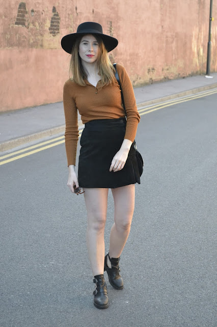 womens affordable highstreet fashion blog featuring British street style. Primark 70's style brown ribbed fitted top. Vintage Black suede skirt with slit up one side. Black topshop boots with cut. Asos matador hat in black felt. TK Maxx zebra print bag.