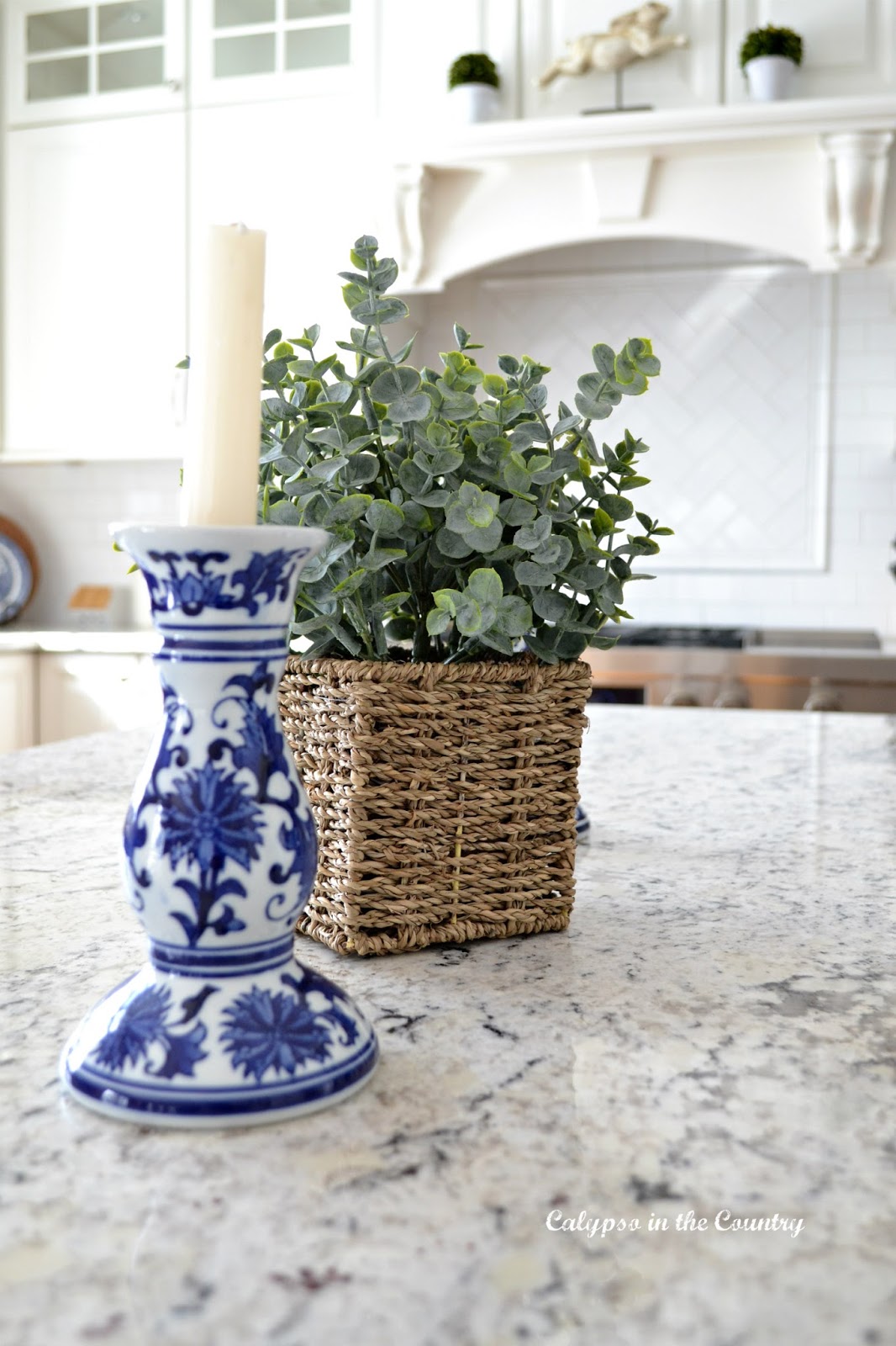 blue and white candlesticks in kitchen