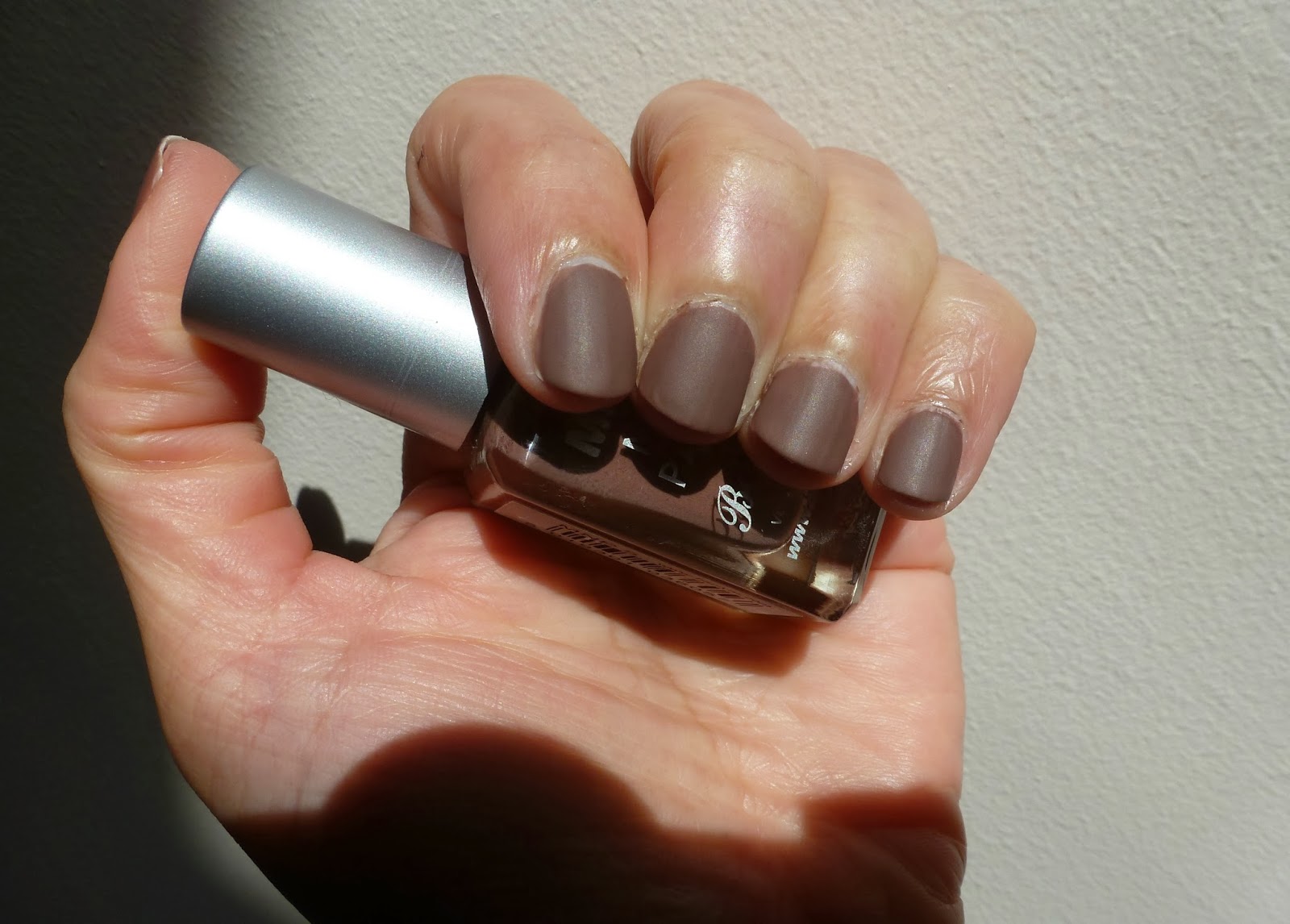 A picture of Barry M Matte Nail Paint in Mocha with No7 Matte Topcoat