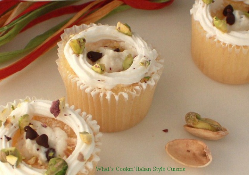 Italian Cannoli Filled Cupcakes a decadent filling with ricotta cheese, chocolate and pistachio