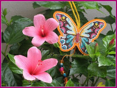 Cross stitched butterfly on plastic canvas 1