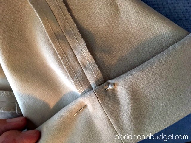 If your dress pants are a little long, you'll want to hem them. Find out how to blind hem your dress pants for a wedding in this post from www.abrideonabudget.com.
