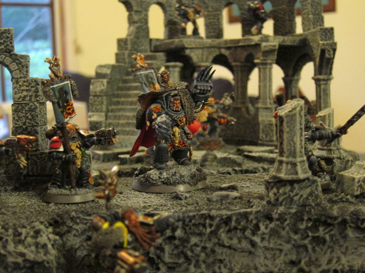 Middle Earth Strategy Battle Game and Warhammer 40k Ruins on full realm of battle board with