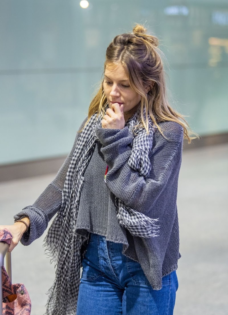 Sienna Miller Clicked in Heathrow Airport in London