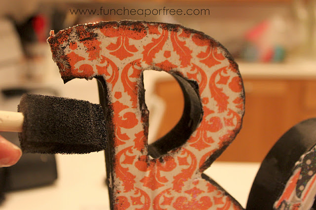 Putting paint on wooden letters, from Fun Cheap or Free