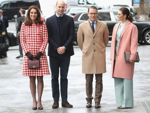 Kate Middleton wore a Catherine Walker coat, and wore a bespoke Alexander McQueen dress. Princess Victoria wore Acne-Studios coat