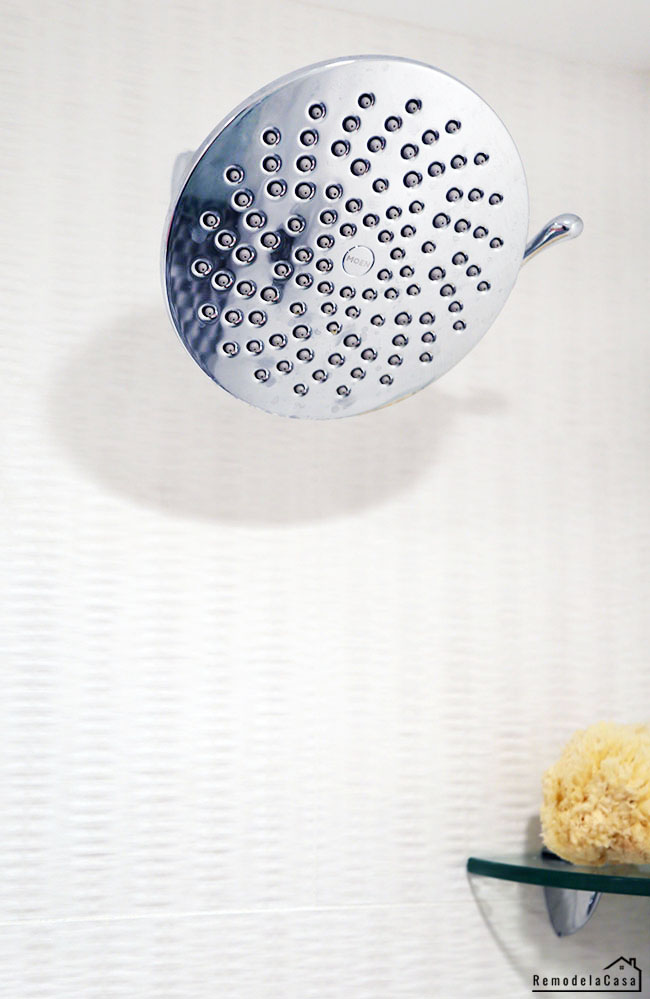 Shower with tile all the way up to the ceiling and Moen rainshower showerhead