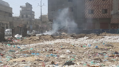 Mominabad Football Ground in Orangi Town, district West of Karachi turns into garbage dump Mominabad Football Ground in Orangi Town, district West of Karachi turns into garbage dump