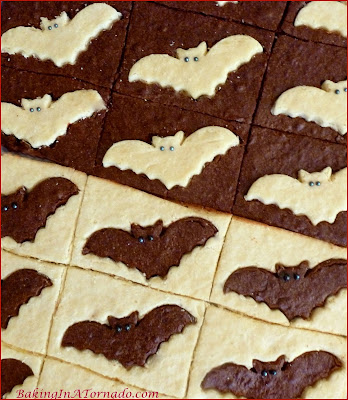 Black and White Brownie Bats, thin chocolate and white chocolate brownies decorated for Halloween. | Recipe developed by www.BakingInATornado.com | #recipe #chocolate #Halloween