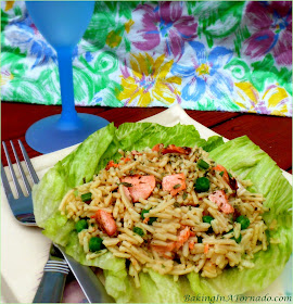A cool meal for a hot day, Parmesan Balsamic Salmon Salad marries balsamic and parmesan flavors with rice, peas and grilled salmon. | Recipe developed by www.BakingInATornado.com | #recipe #lunch