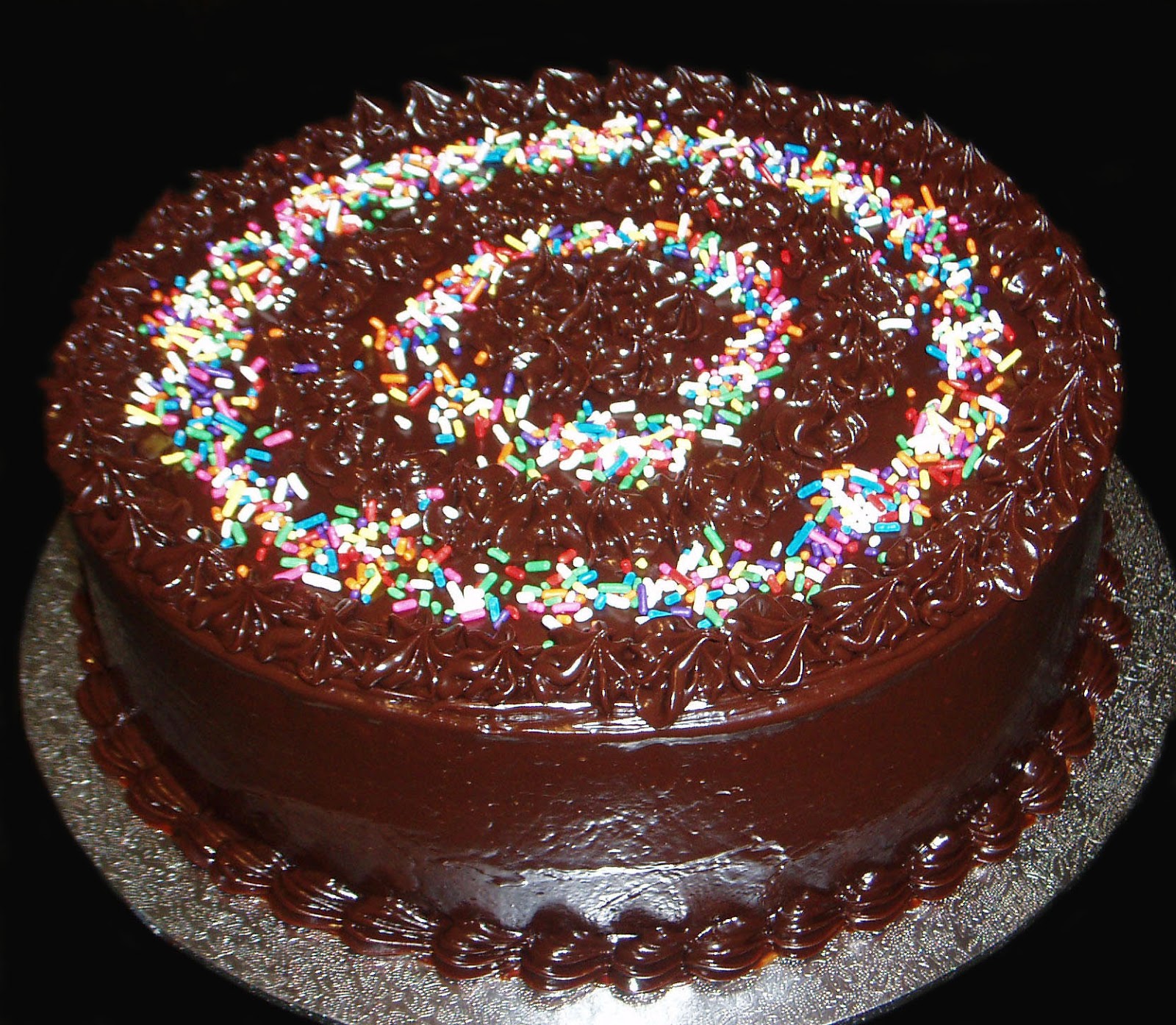 Collection 90+ Pictures Chocolate Cake With Sprinkles On Top Stunning